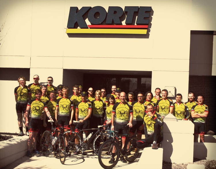 What business does a Design-Build construction company have sponsoring a bike team?