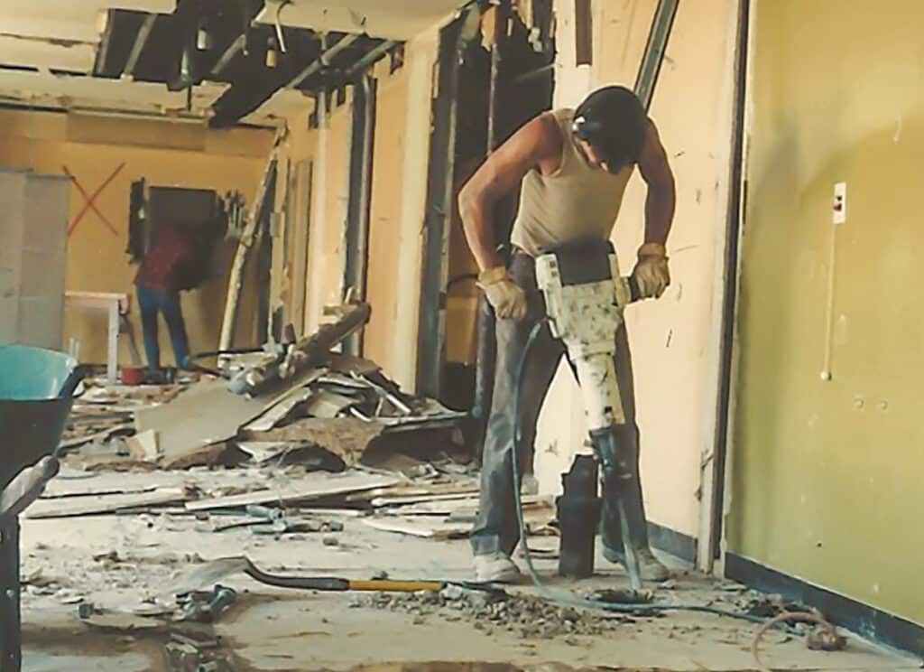 Brian works a jackhammer.